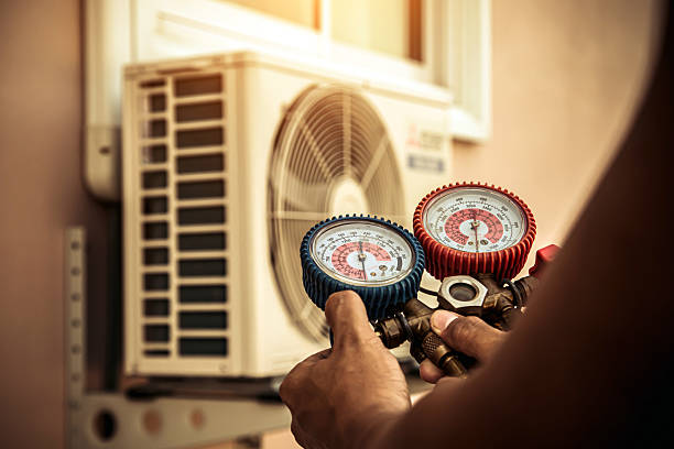 Professional Heat Pump Repair technician working in Sumter, SC